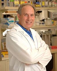 Photo of Dennis Drayna in NIH Lab